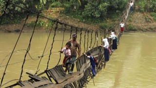 children-on-bridge-going-to-shool_mini