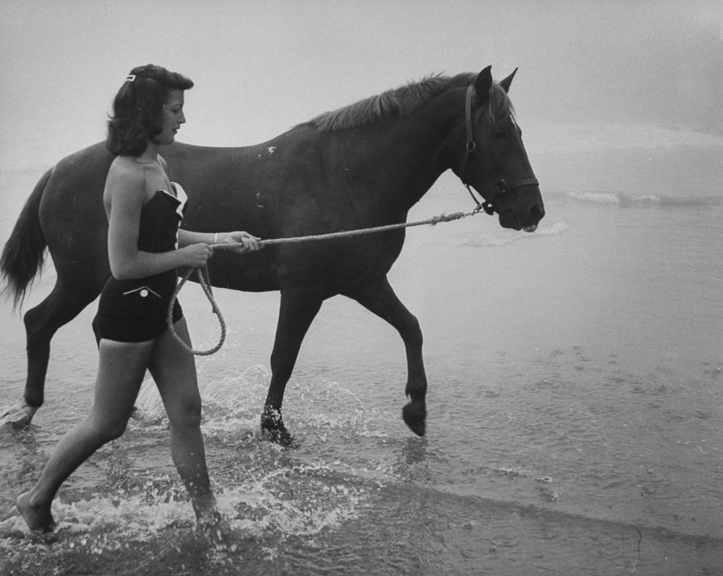 Woman walking the diving horse.  (Photo by Peter Stackpole/The LIFE Picture Collection/Getty Images)