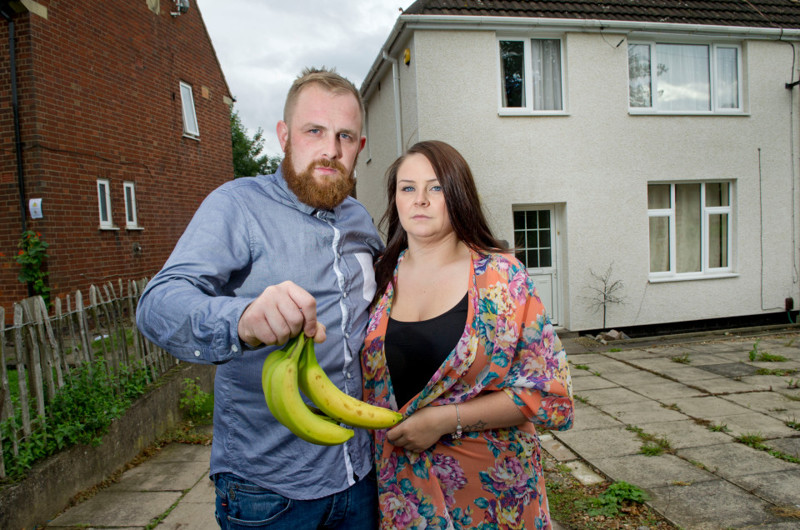 Ashley Gamble, 28,and his partner Sophia, who have fled from their home with their two children, including a three week old daughter, after it was invaded by around 150 of the most deadly spiders in the world who arrived on a banana from Asda and hatched out in their kitchen (NOT IN THE BANANAS SHOWN HERE). The family were advised to move out by a pest control company and are living at Ashleys parents house. See story by Andrew Parker.