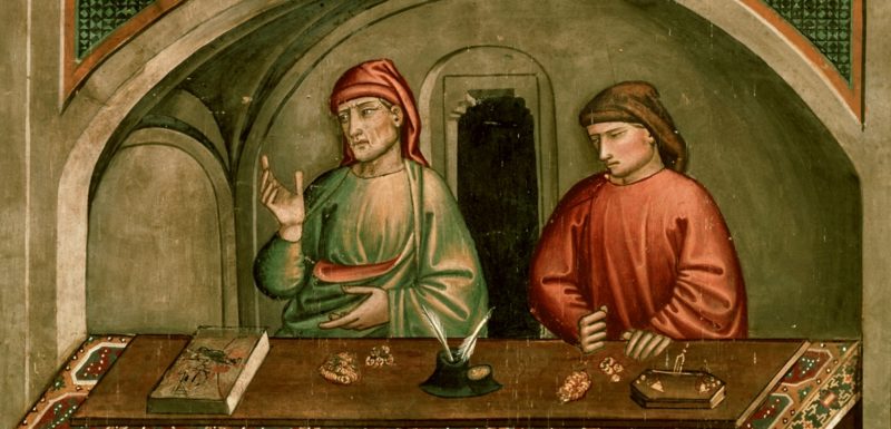 два средневековых банкира в конторе за столом