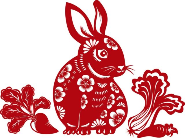 рисунок красного кролика на белом фоне