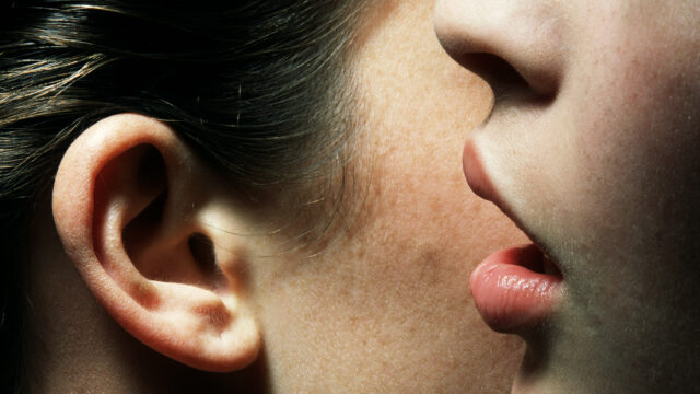женские губы на фоне женского лица